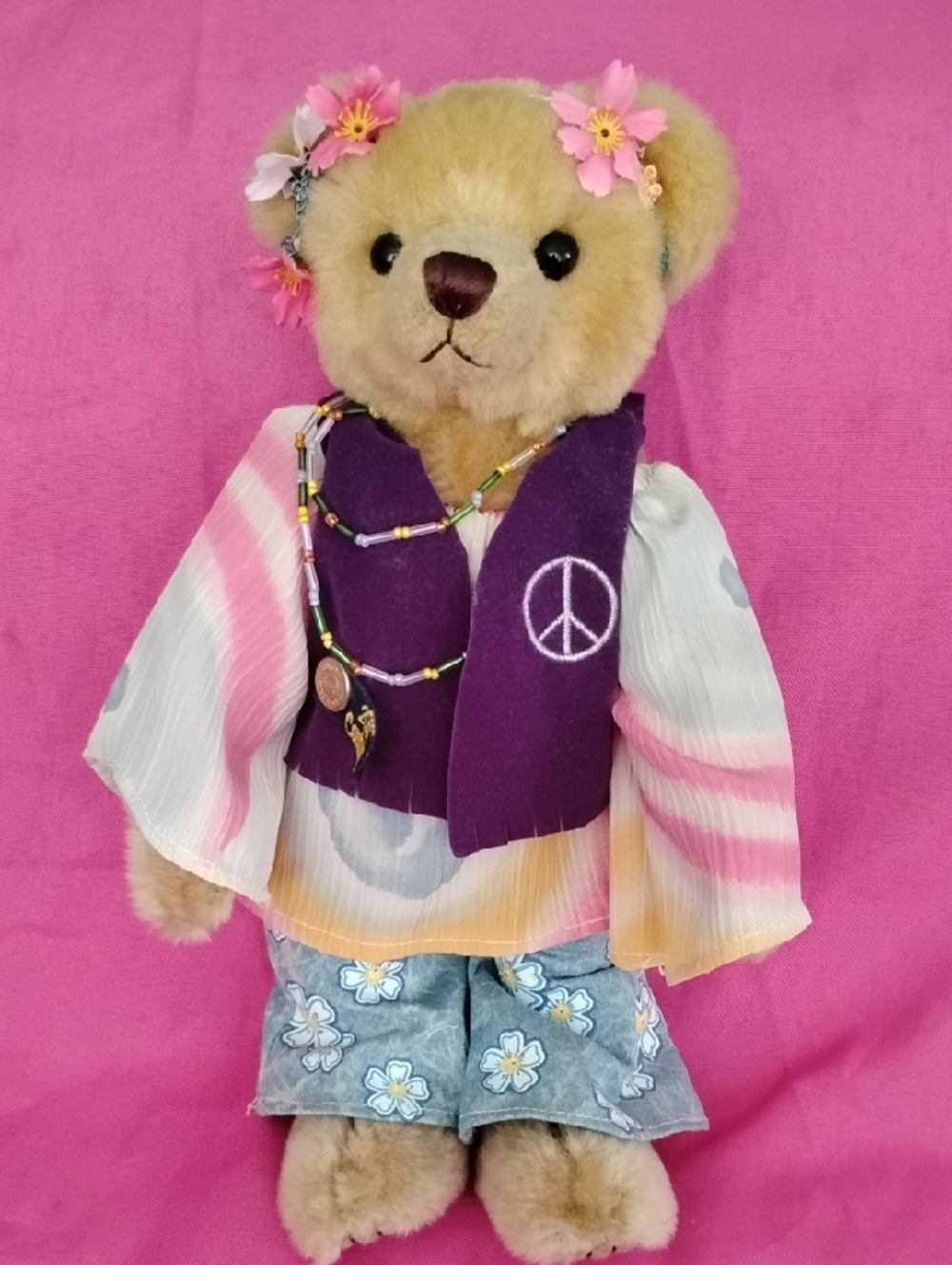 Plush Teddy Bear in Hippie Pink Outfit with Purple Vest.